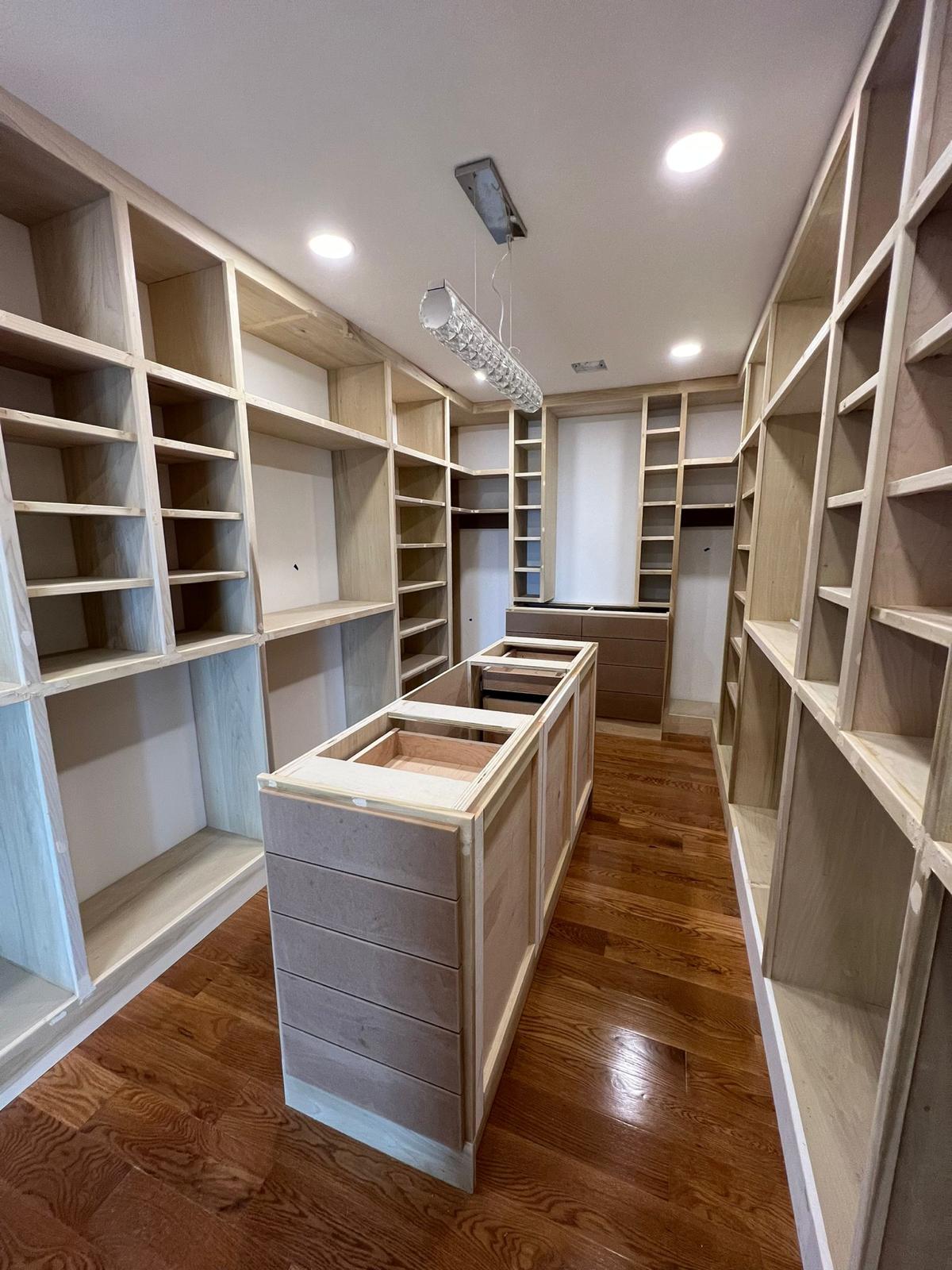 Custom walk-in closet, built-ins scribed to the field